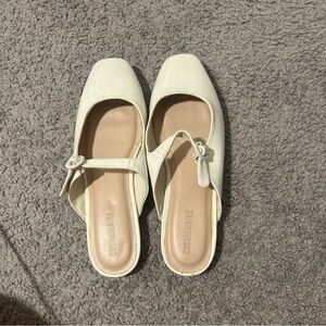 cream leather slip on mules